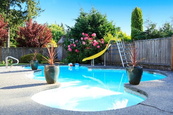 A backyard pool is possible, even if you have a playset there already.
